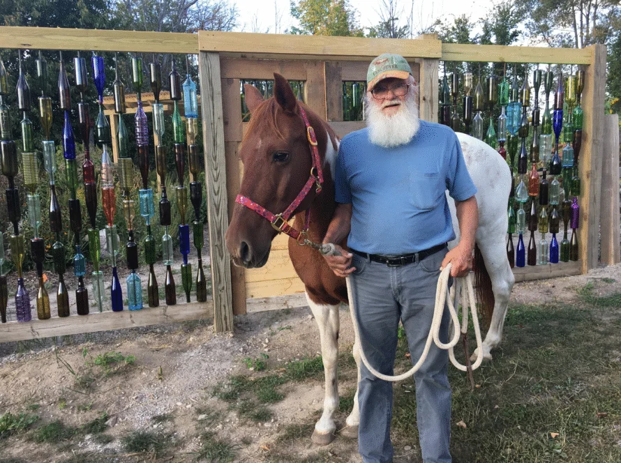 A Veteran at the ranch garden gate
